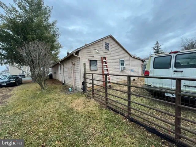 a house view with a backyard space