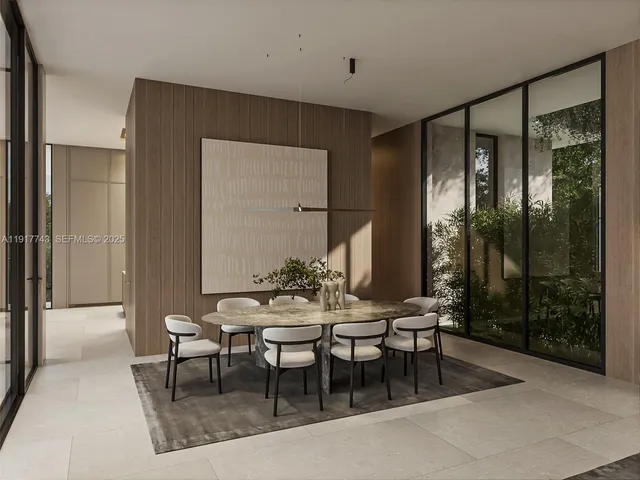 a view of a dining room with furniture and window