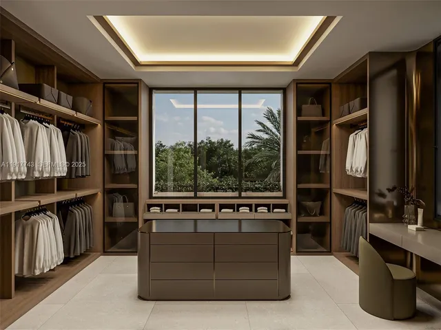 a view of kitchen with furniture and large window