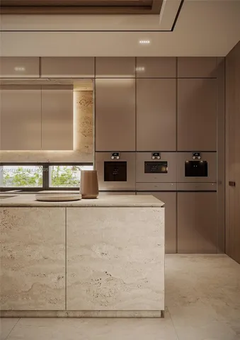 a kitchen with stainless steel appliances wooden cabinets and a counter top space