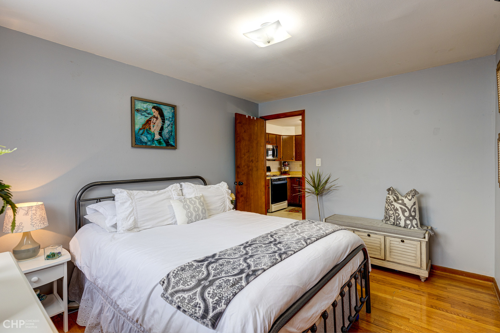 10808 Massasoit Avenue Chicago Ridge, IL 60415 - Photo 19 of 33 a bedroom with a bed and a couch