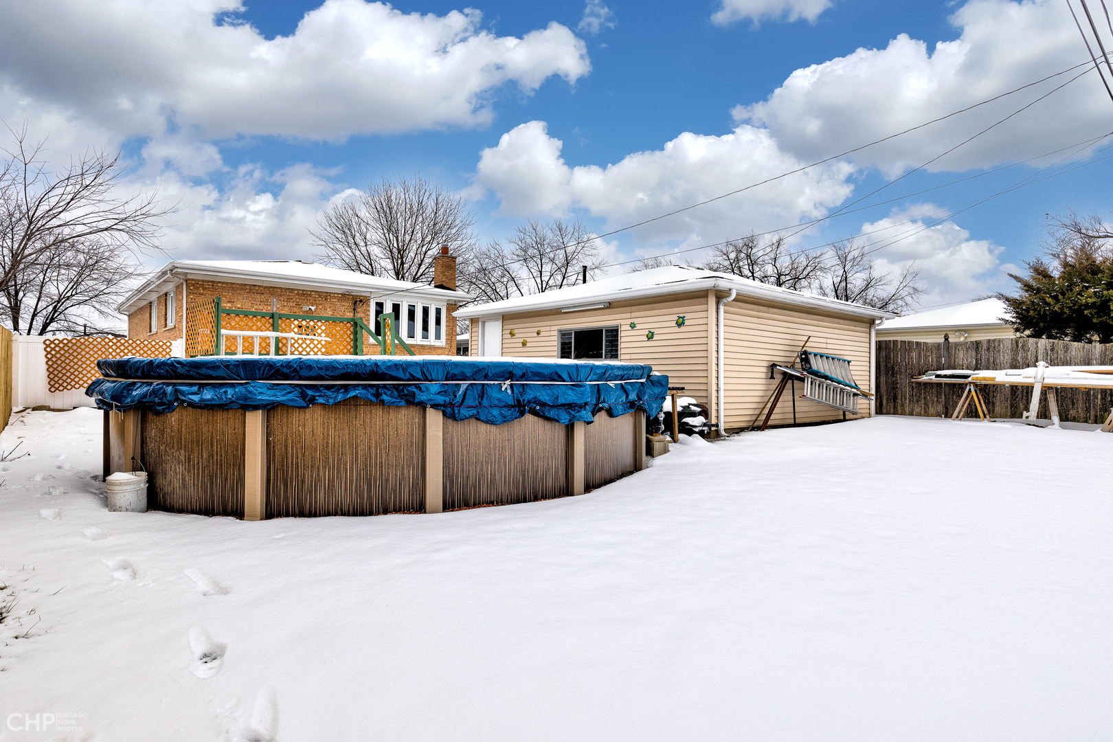 10808 Massasoit Avenue Chicago Ridge, IL 60415 - Photo 31 of 33 a view of a house with a wooden fence