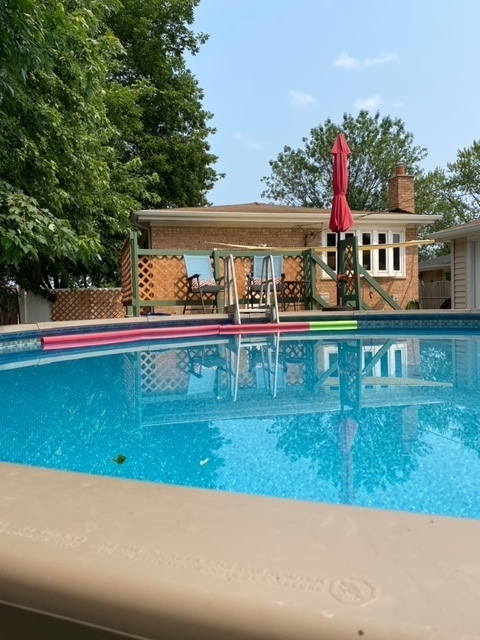 10808 Massasoit Avenue Chicago Ridge, IL 60415 - Photo 32 of 33 a view of a house with a yard