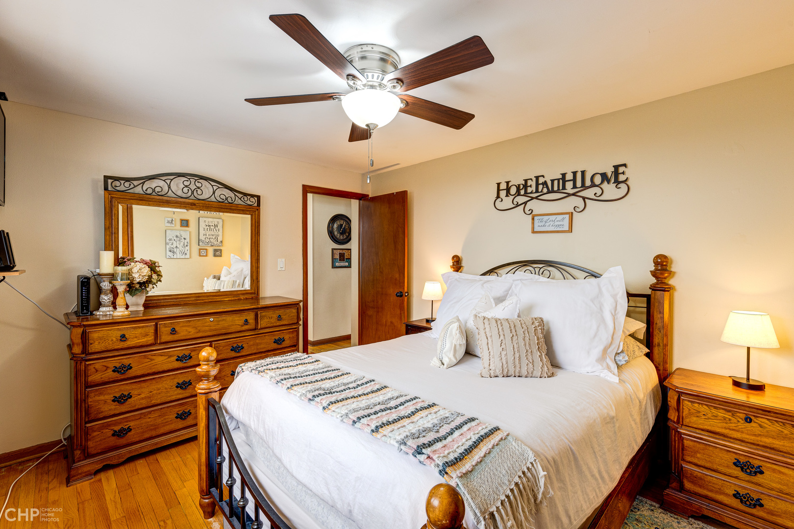 10808 Massasoit Avenue Chicago Ridge, IL 60415 - Photo 10 of 33 a bedroom with a bed and wooden floor