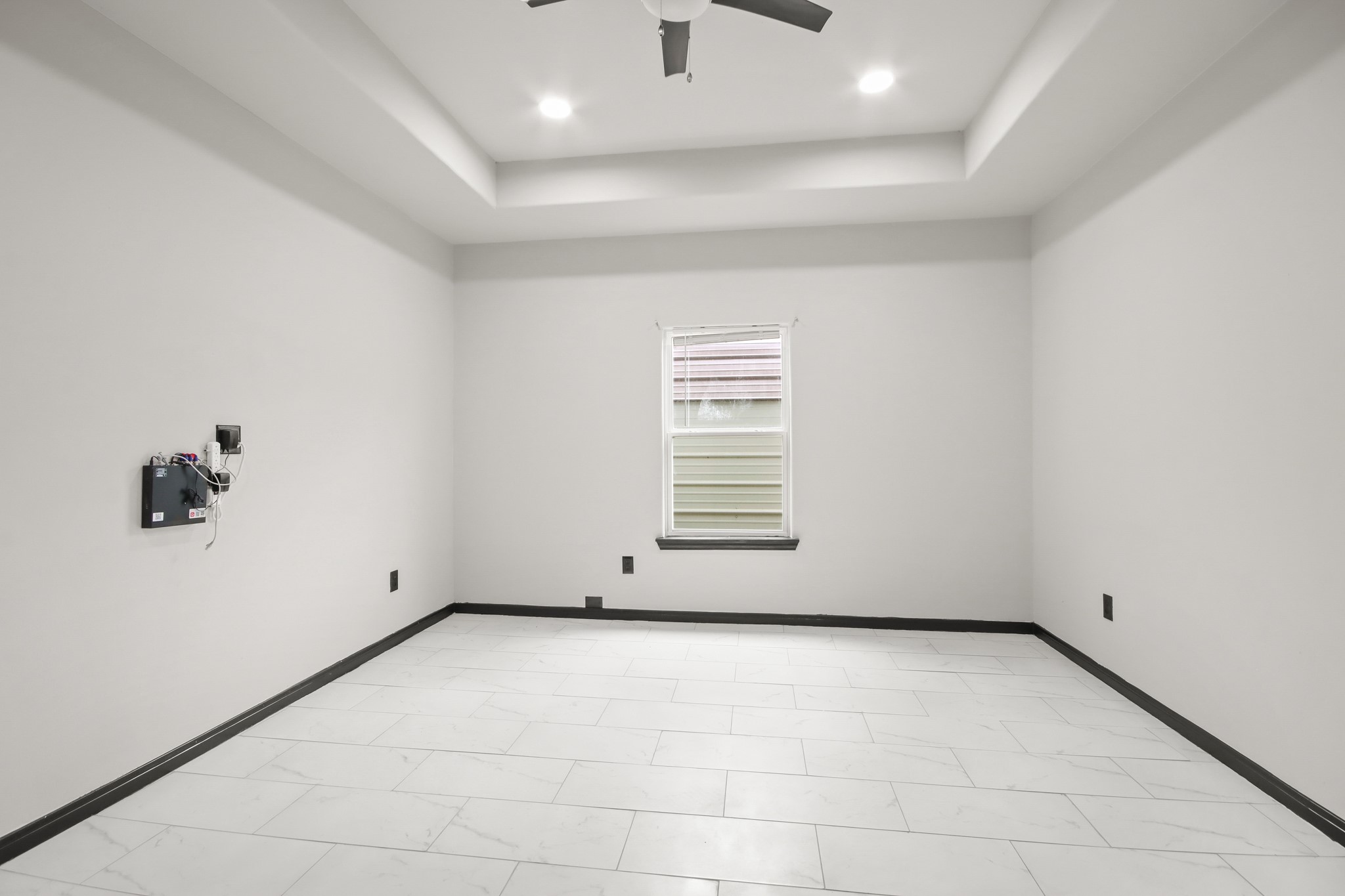 131 South Tyler Road Goodrich, TX 77335 - Photo 11 of 26 an empty room with a empty space and window
