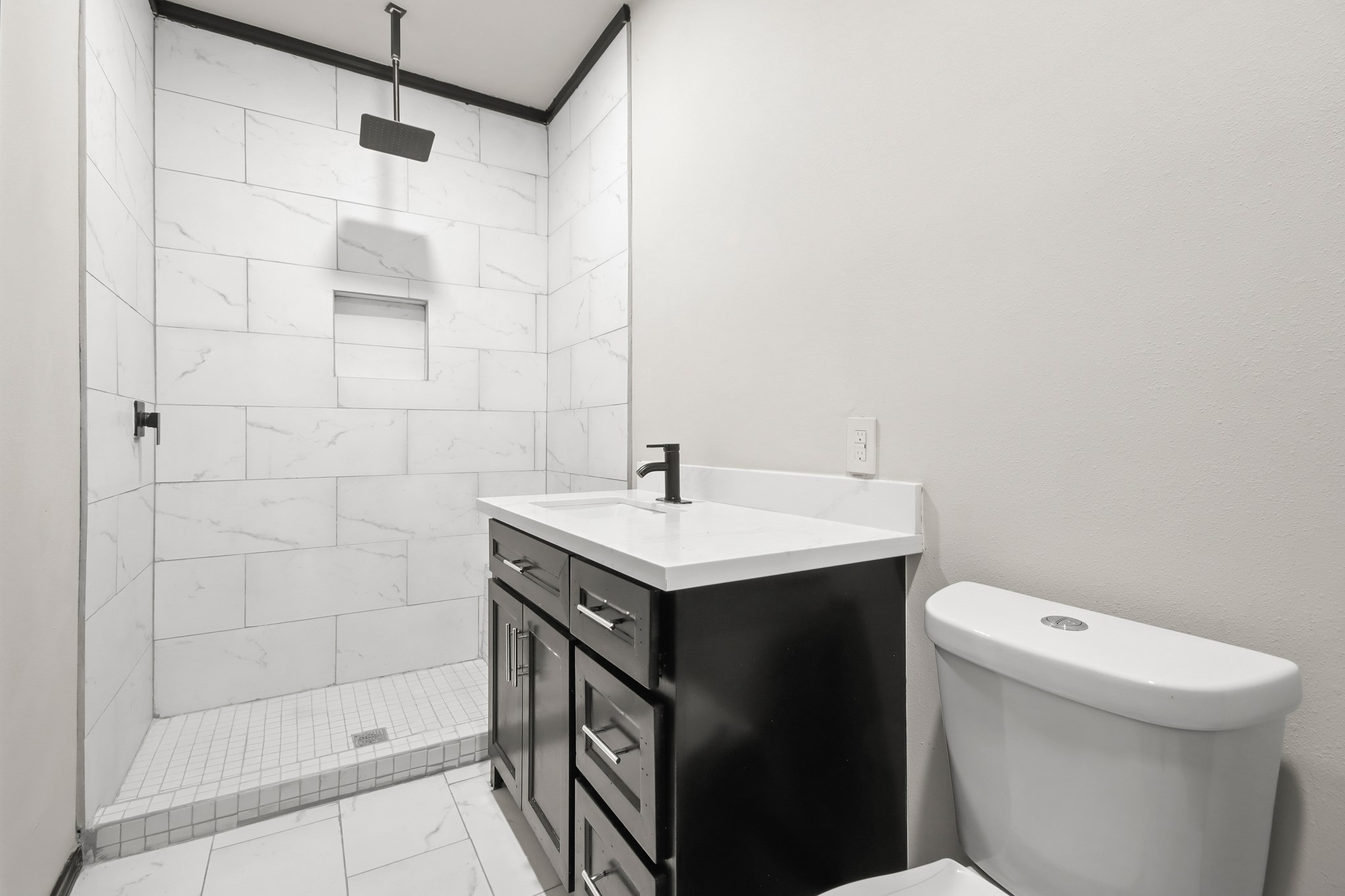 131 South Tyler Road Goodrich, TX 77335 - Photo 14 of 26 a bathroom with a sink toilet and shower