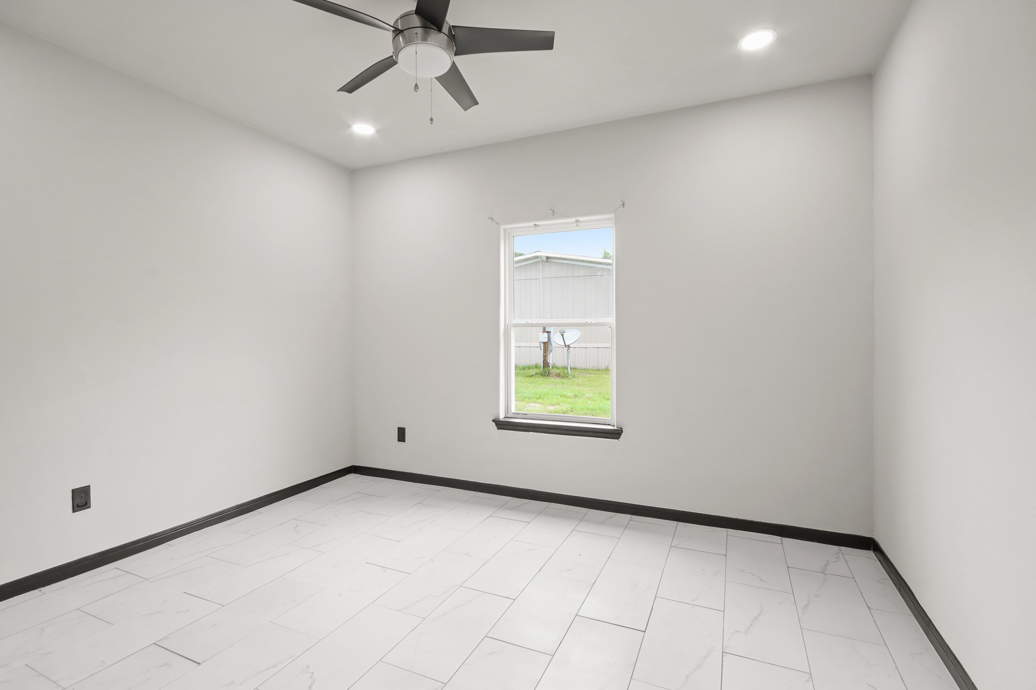 131 South Tyler Road Goodrich, TX 77335 - Photo 19 of 26 an empty room with windows and closet