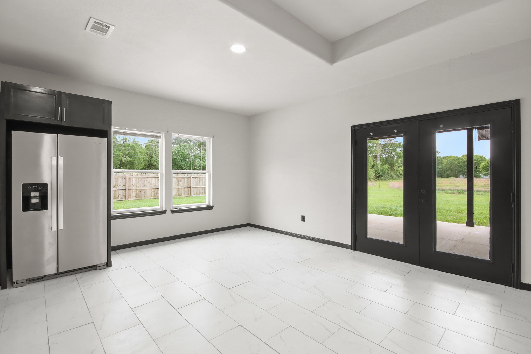 131 South Tyler Road Goodrich, TX 77335 - Photo 6 of 26 a view of an empty room with a window