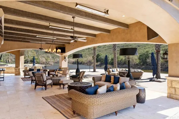 a living room with patio furniture