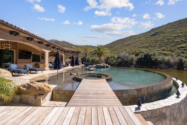 a view of a building with a yard