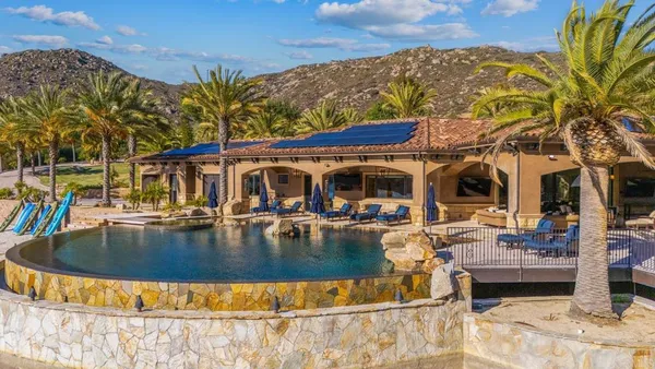 a view of a park with palm trees