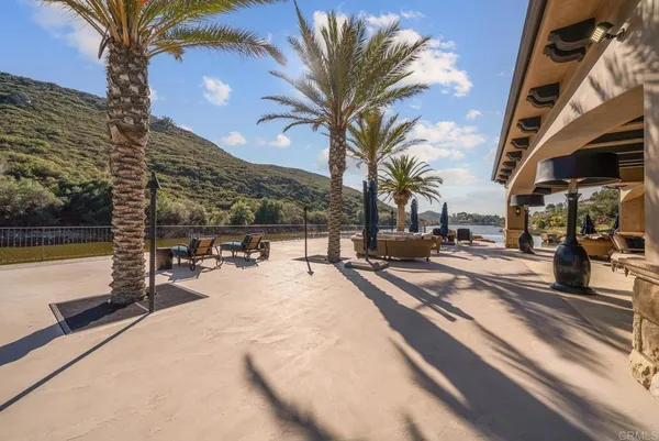 a lobby with a couch and potted plant