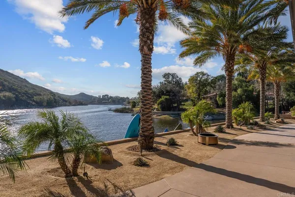 a living room with furniture fireplace and flat screen tv