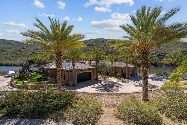 a living room with furniture flat screen tv and a fireplace