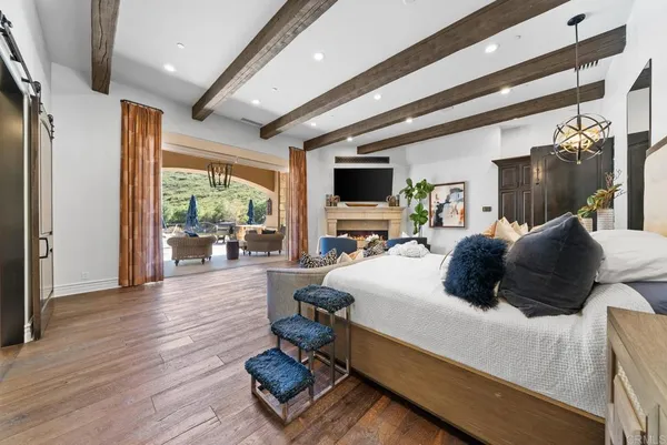 a view of a swimming pool with an outdoor seating