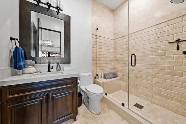 a living room with furniture a rug and a window