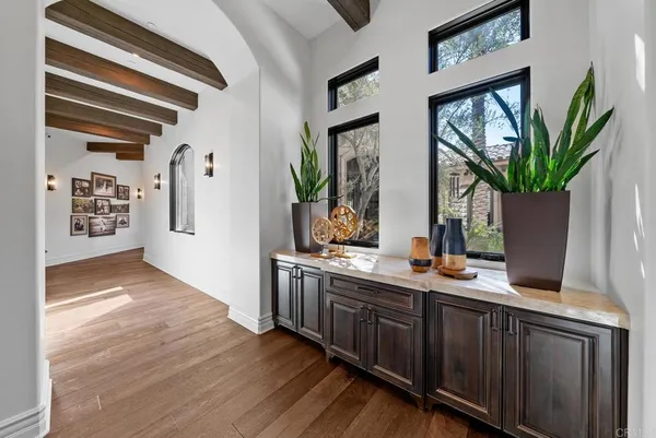 a bathroom with a toilet a sink and a mirror