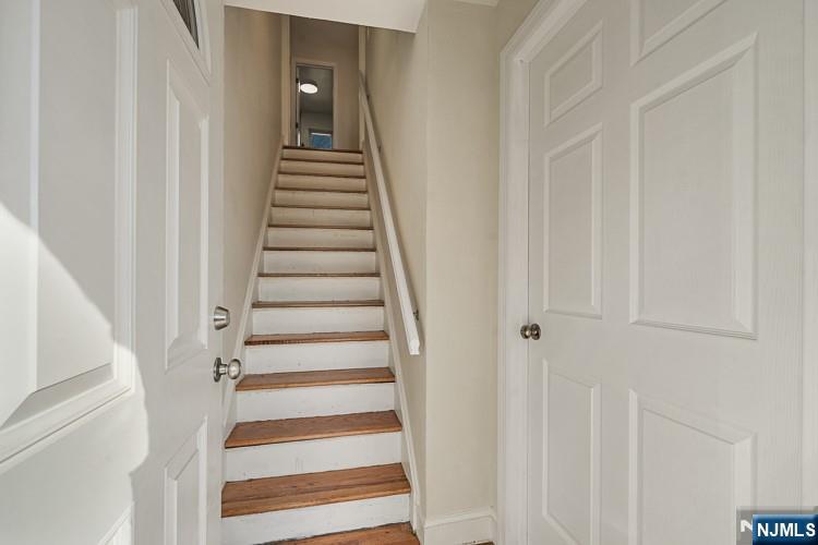 13 Casta Lane, Unit 2 Edgewater, NJ 07020 - Photo 14 of 23 a view of a hallway with front door