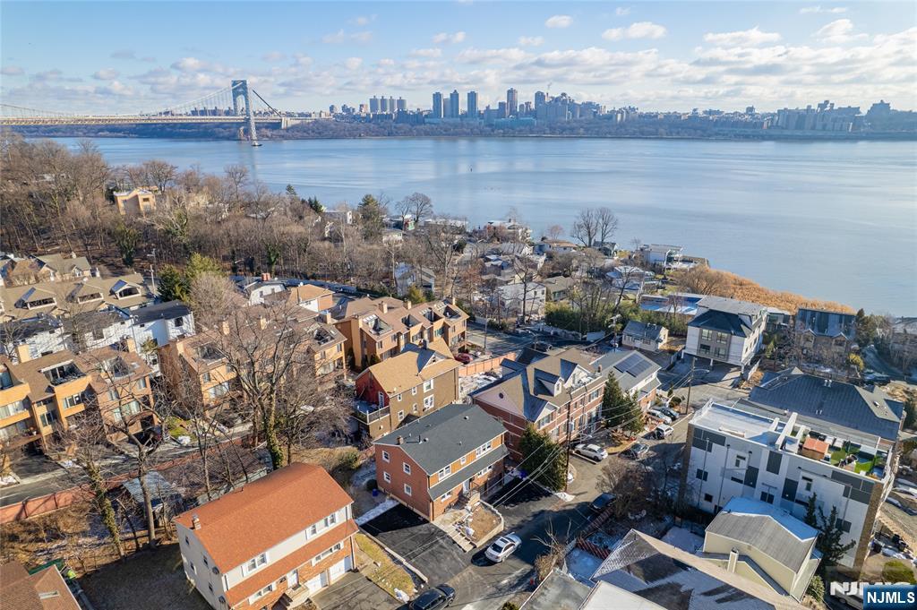 13 Casta Lane, Unit 2 Edgewater, NJ 07020 - Photo 20 of 23 a view of a city and lake view
