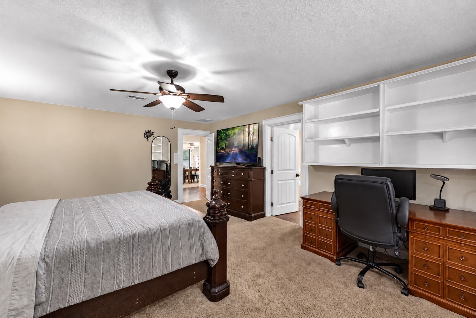 22698 Brook Forest Road New Caney, TX 77357 - Photo 17 of 46 Oversized primary suite featuring built-in shelving and abundant space!
