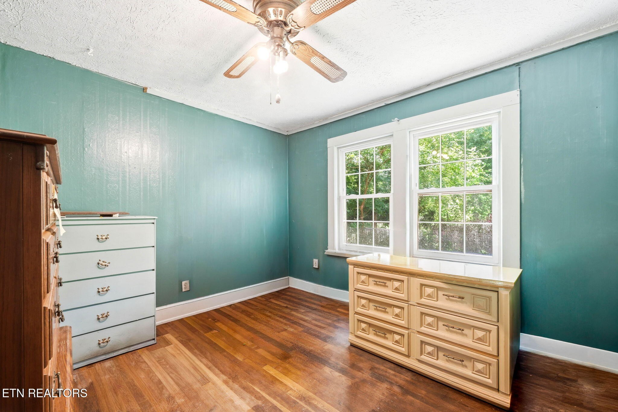 3992 Highway 92 Rutledge, TN 37861 - Photo 22 of 34 a bedroom with a bed and a dresser
