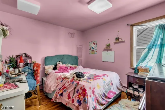 a bedroom with a bed and a bed