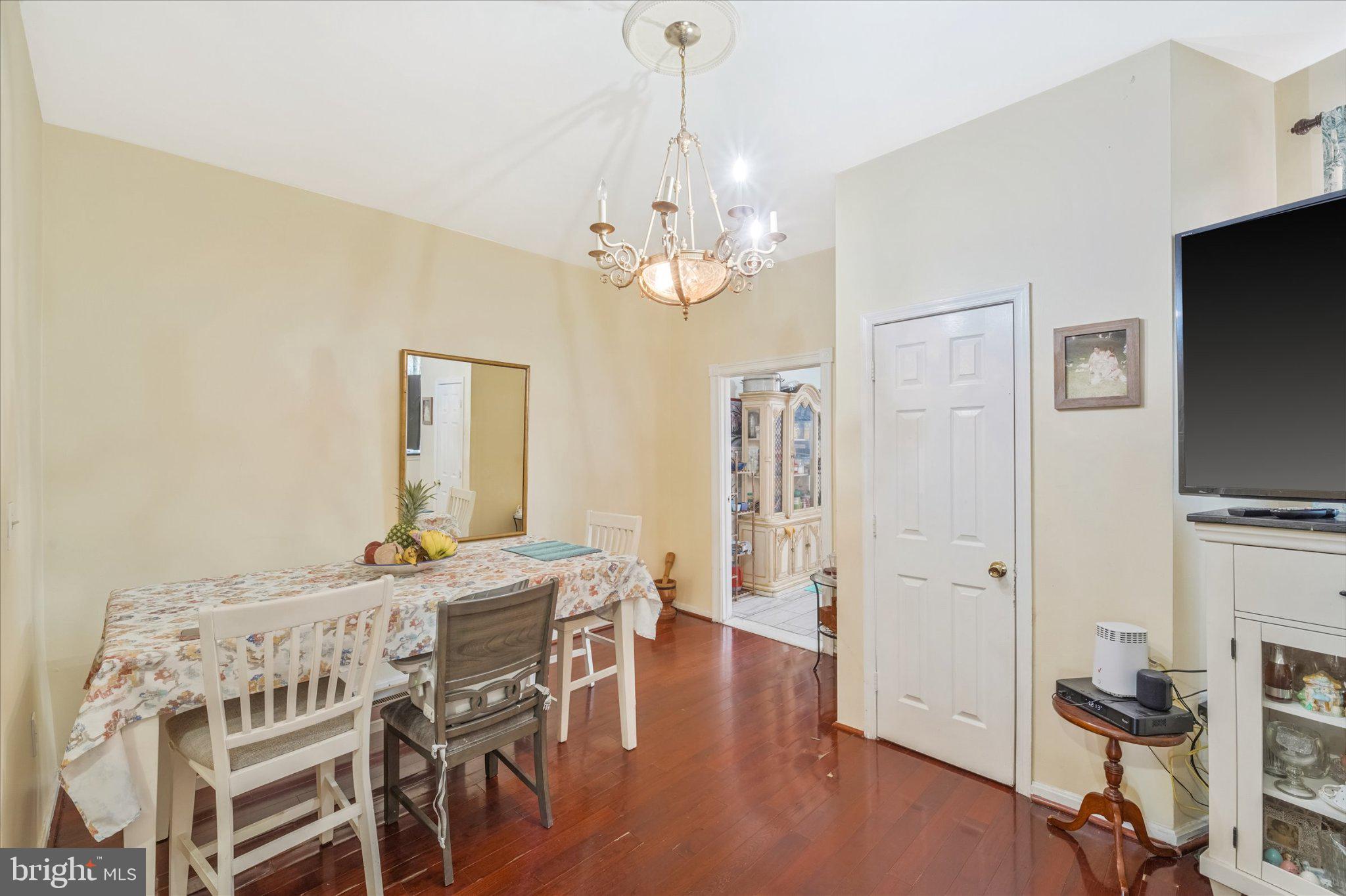 3113 11th Street Northwest Washington, DC 20010 - Photo 12 of 42 Charming dining space with warm tones.