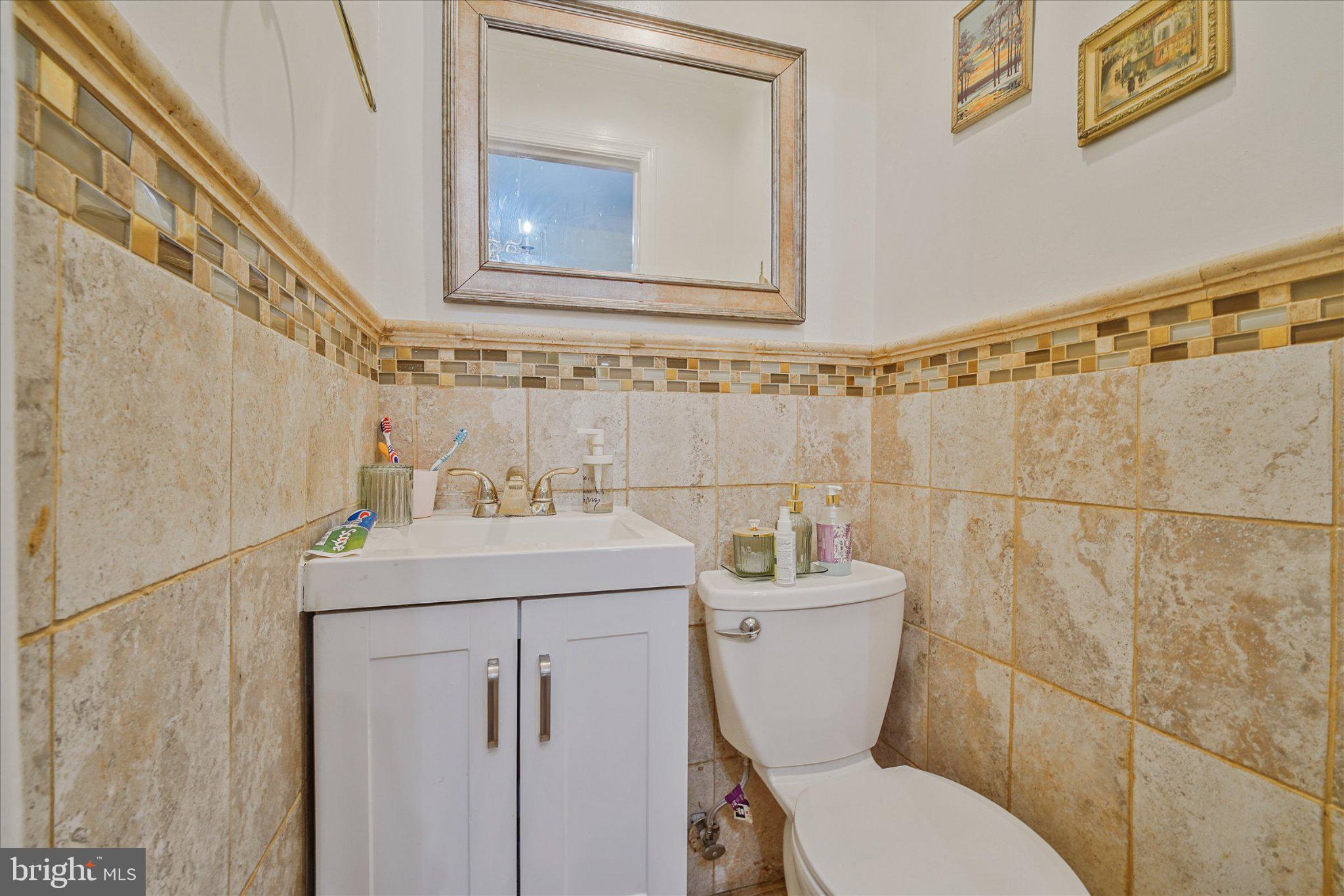 3113 11th Street Northwest Washington, DC 20010 - Photo 17 of 42 Elegant bathroom with stylish tiles.