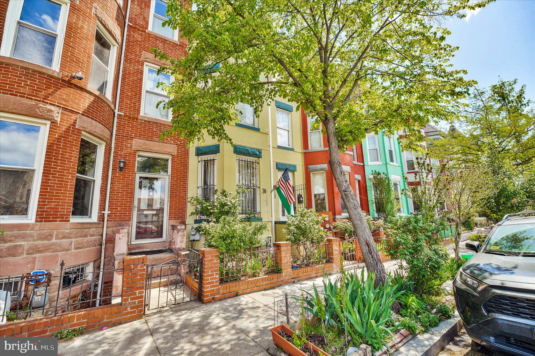 3113 11th Street Northwest Washington, DC 20010 - Photo 2 of 42 Charming row homes with vibrant hues.