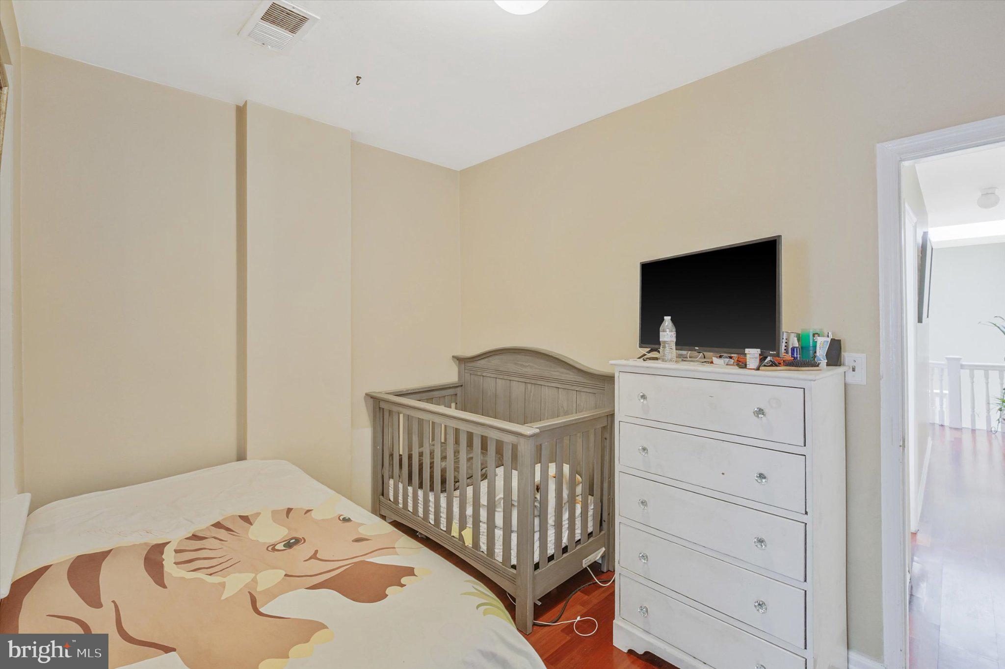 3113 11th Street Northwest Washington, DC 20010 - Photo 24 of 42 Cozy nursery with modern charm.