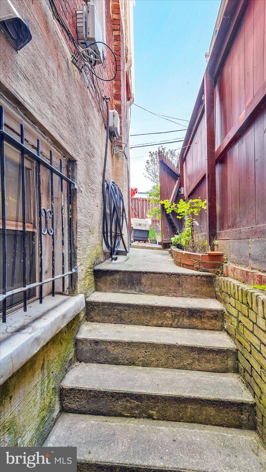 3113 11th Street Northwest Washington, DC 20010 - Photo 42 of 42 Charming alleyway with greenery.