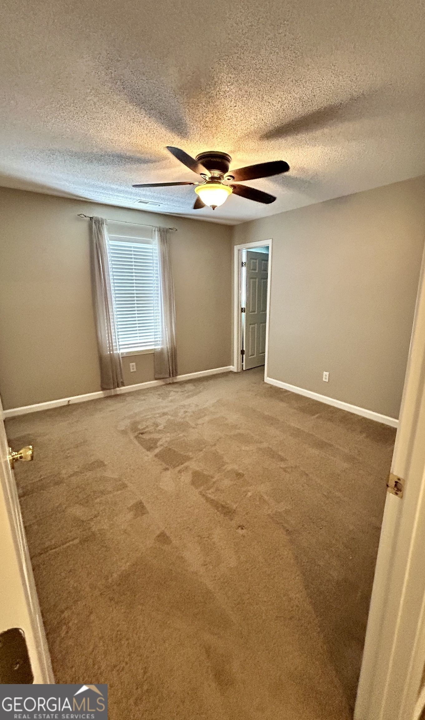 98 Pheasant Ridge Newnan, GA 30265 - Photo 17 of 23 a view of an empty room