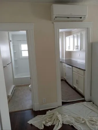 a bathroom with a sink and mirror