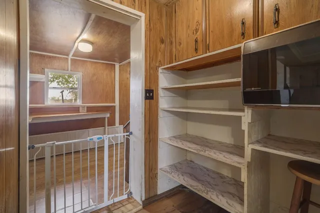 a view of swimming pool with a yard