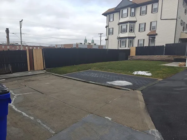 a view of a backyard with plants