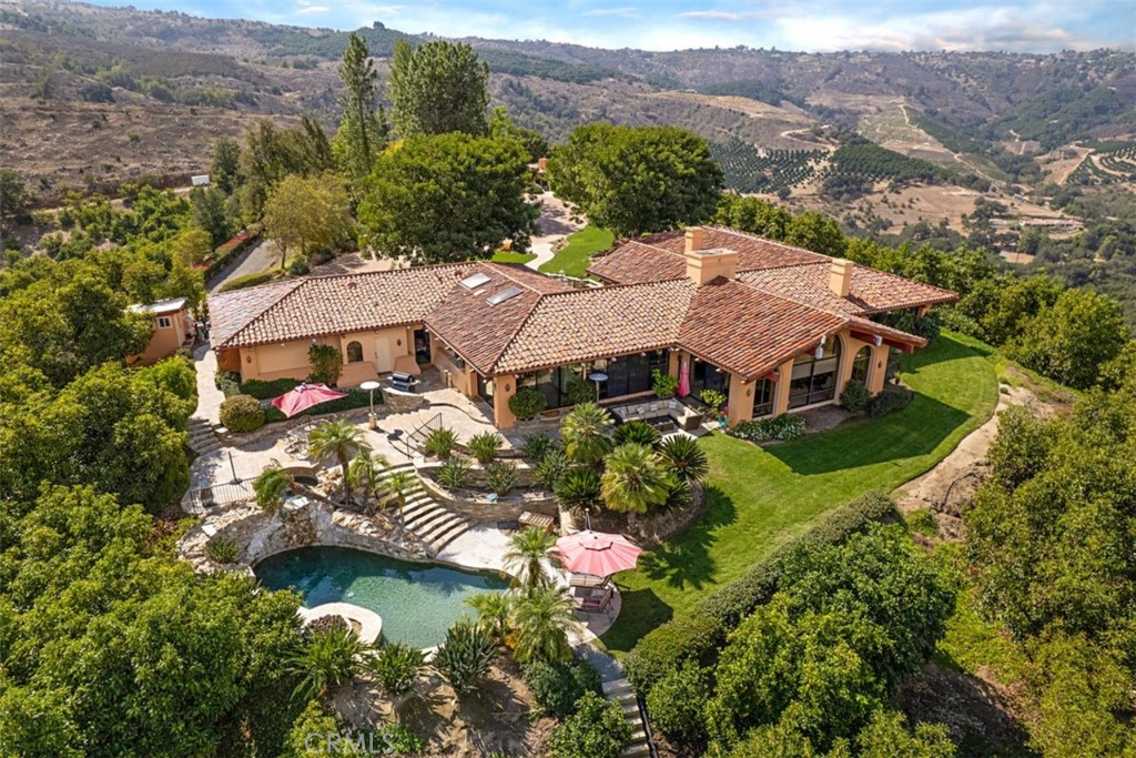 32228 Pauma Heights Road Pauma Valley, CA 92061 - Photo 1 of 1 an aerial view of house with yard swimming pool and mountains