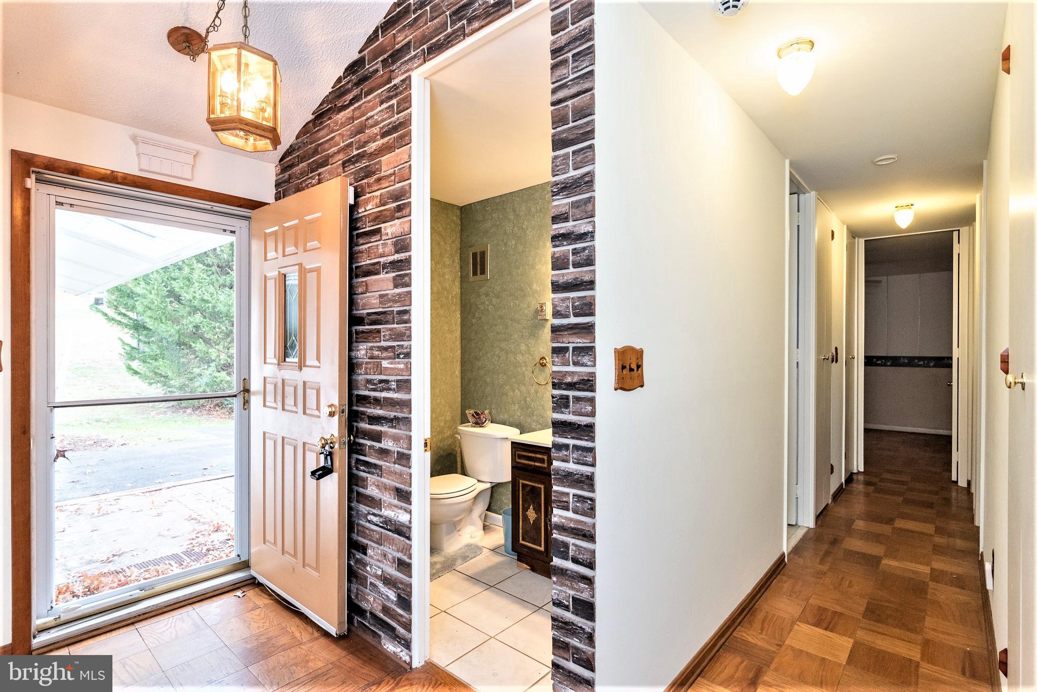 406 Barksdale Road Joppa, MD 21085 - Photo 4 of 42 Entrance/half bath/hallway