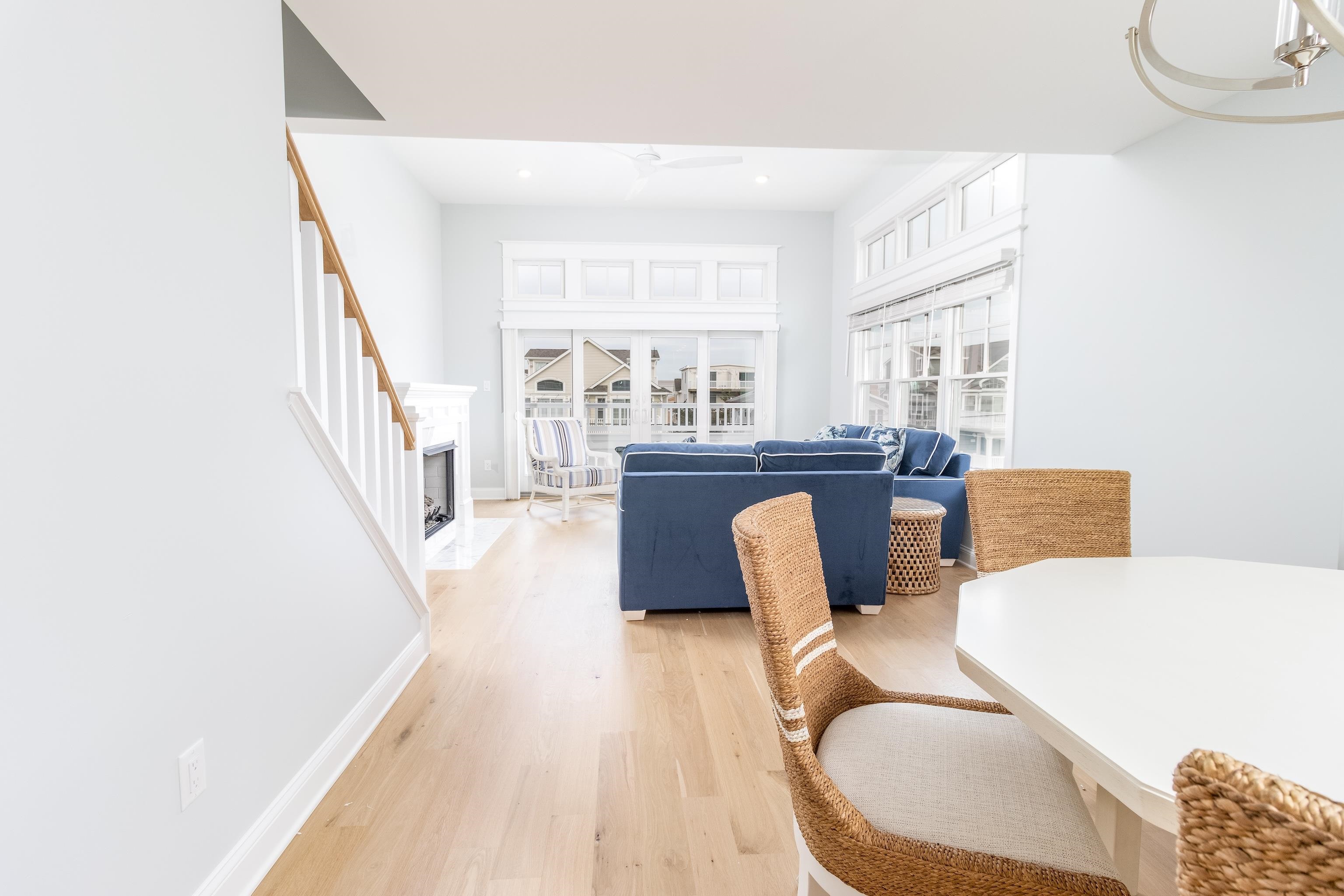 284 33rd, Unit 284 Avalon, NJ 08202 - Photo 13 of 28 a living room with furniture and a large window