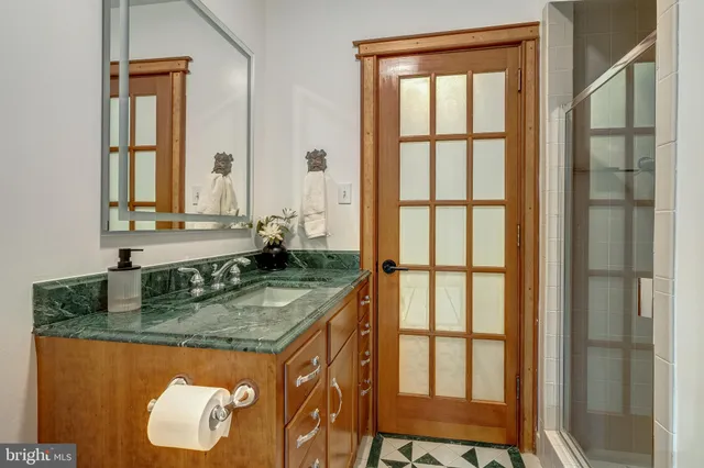 a view of a sink and a window