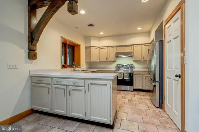 a bed room with a bed and a window