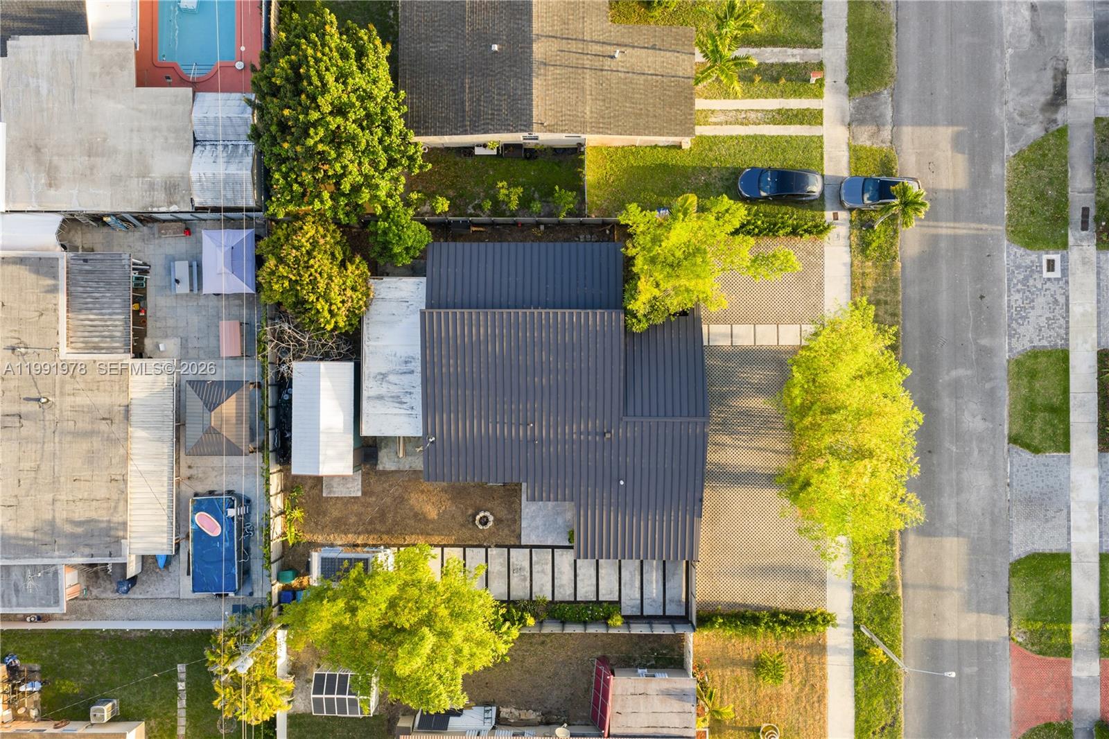 4315 Southwest 97th Court Miami, FL 33165 - Photo 17 of 17 a building view with swimming pool