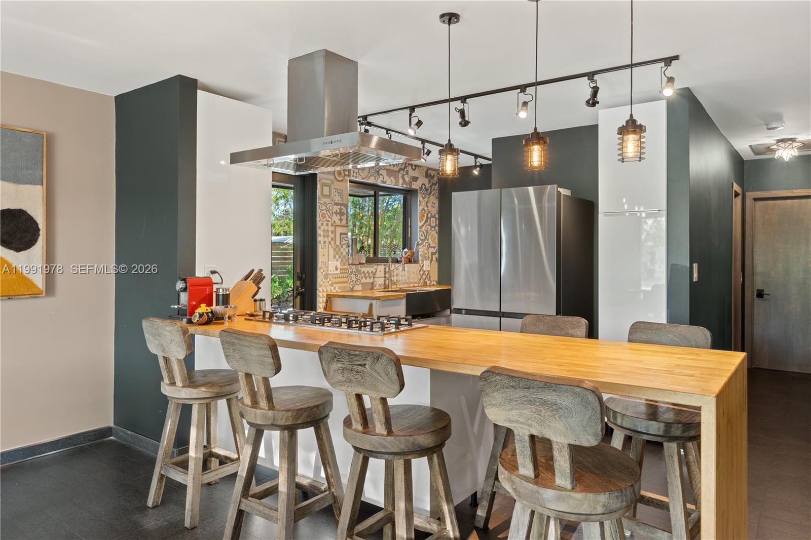 4315 Southwest 97th Court Miami, FL 33165 - Photo 5 of 17 a dining room with furniture and window