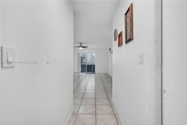 a view of a hallway with a white walls