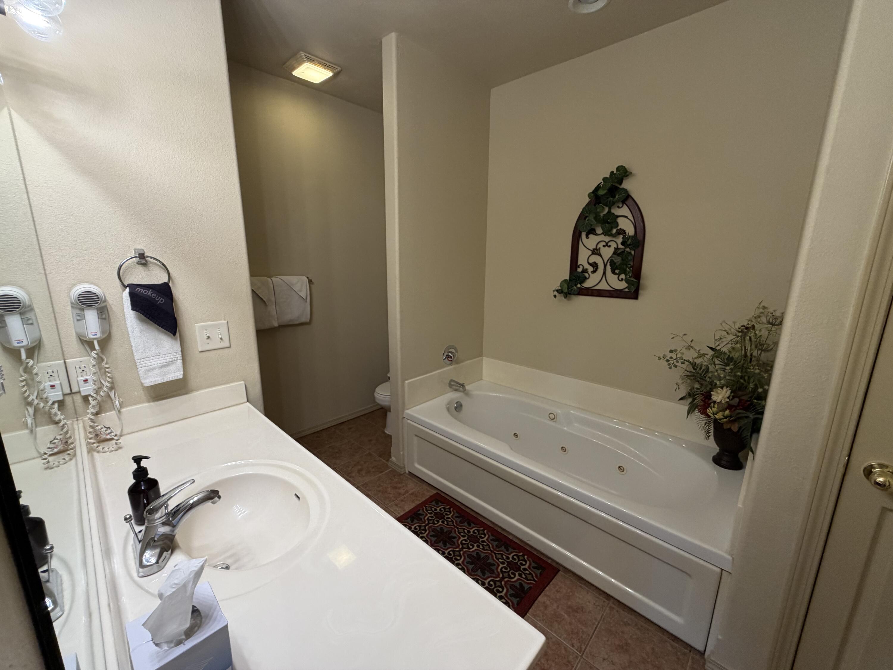 1241 Golf Drive, Unit 1 Reeds Spring, MO 65737 - Photo 20 of 52 Primary Bath Suite