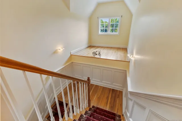 a view of a hallway with windows