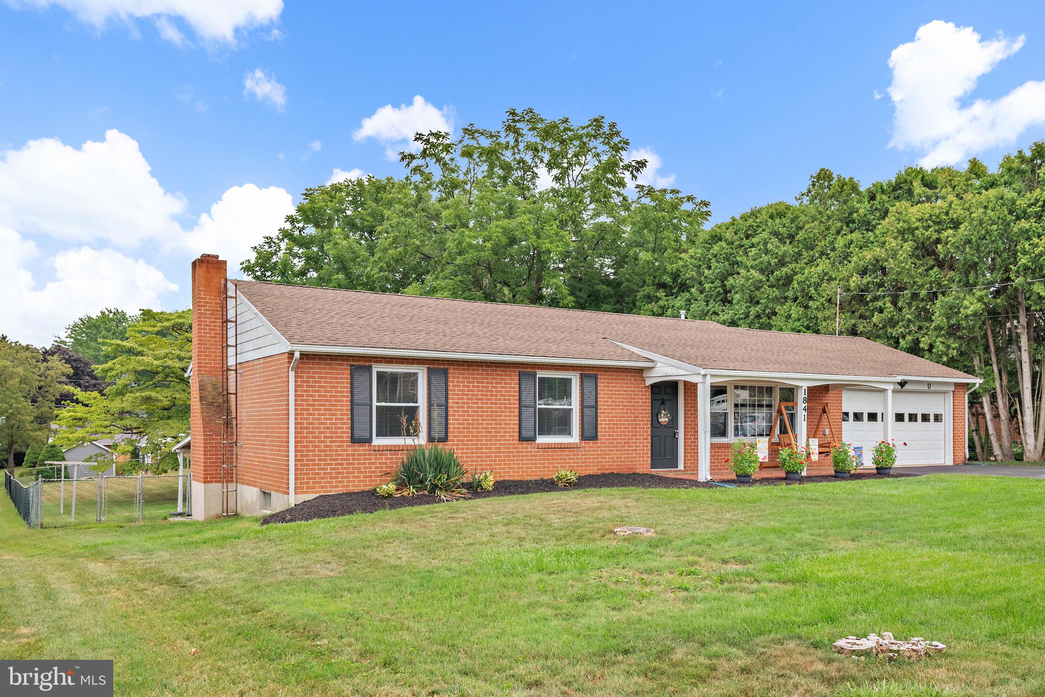 1841 Powder Mill Road York, PA 17402 - Photo 3 of 39 a view of a house with a backyard