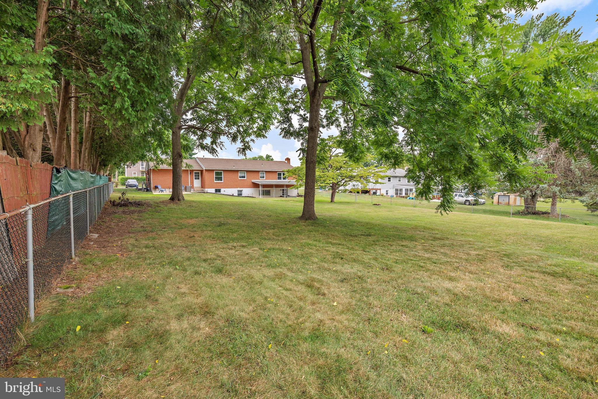 1841 Powder Mill Road York, PA 17402 - Photo 35 of 39 a view of a yard with plants and trees