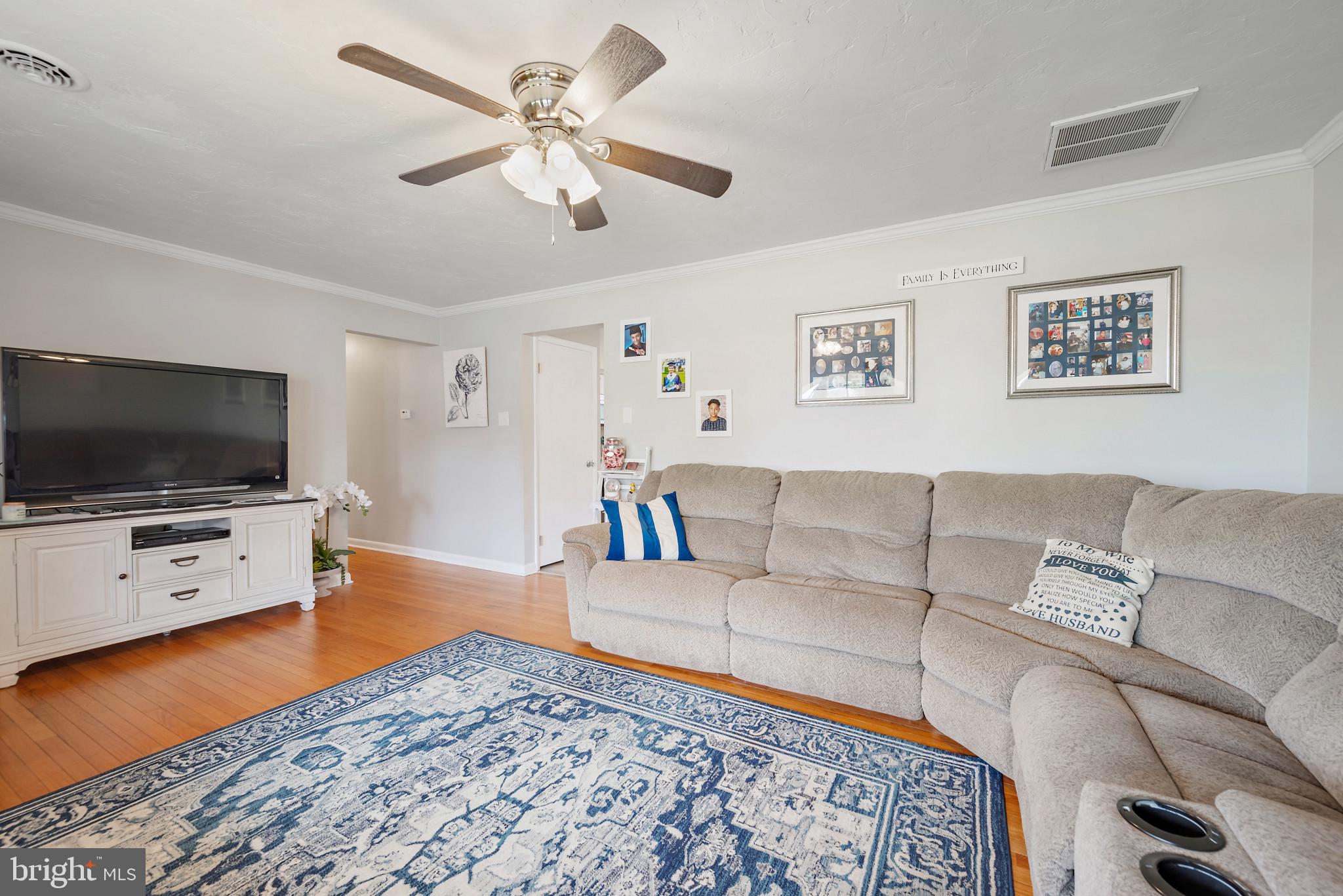 1841 Powder Mill Road York, PA 17402 - Photo 8 of 39 a living room with furniture and a flat screen tv