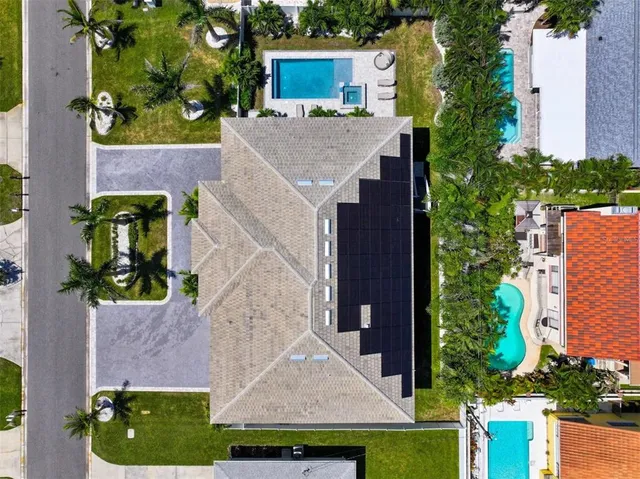 an aerial view of a house with a garden