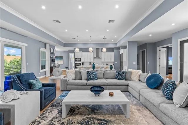 a view of a room with a large window